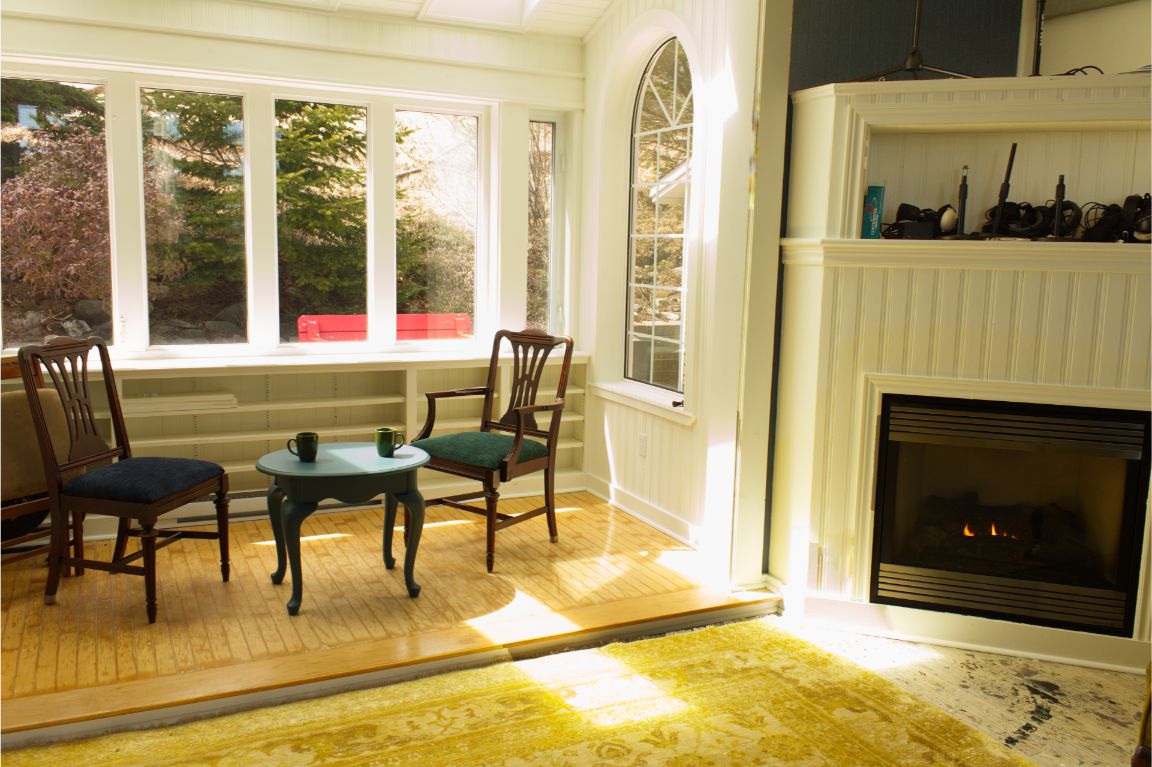 A working fireplace and balcony at the Archangel Studios residence.
