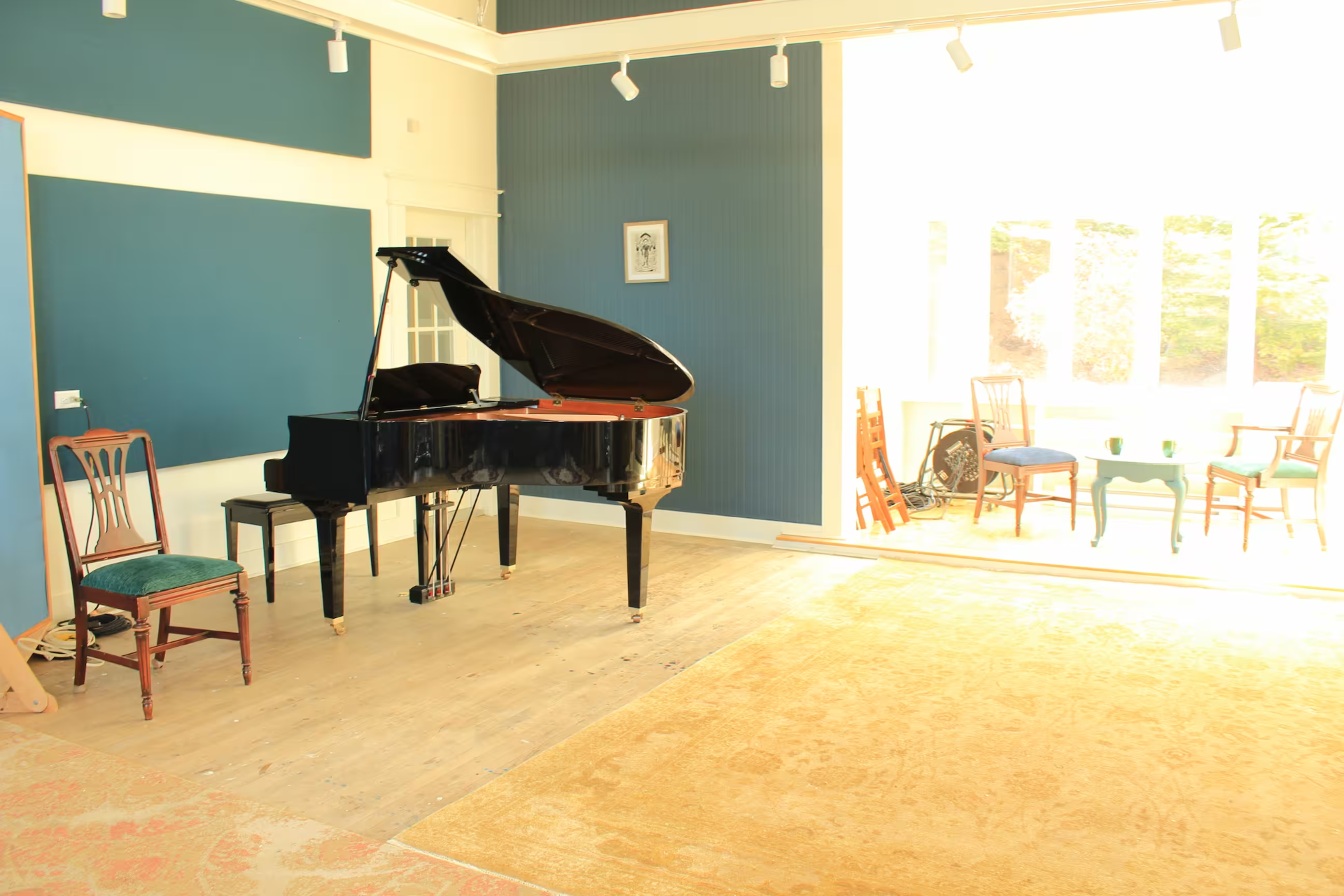 The baby grand piano in The Studio at Archangel Studios.